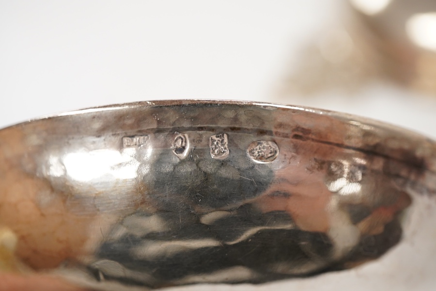 A pair of George V continental silver quaichs, with pierced lug handles and each engraved with a three-masted ship at sea, import marks for Berthold Hermann Muller, London, 1913, 17.3cm.